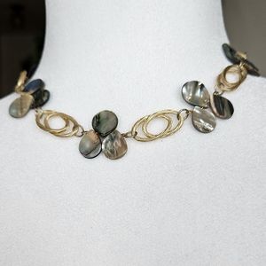 Blue mother of perl necklace with gold tone links